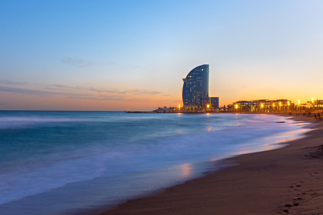 the beach of barcelona at sunset P6DMYCD